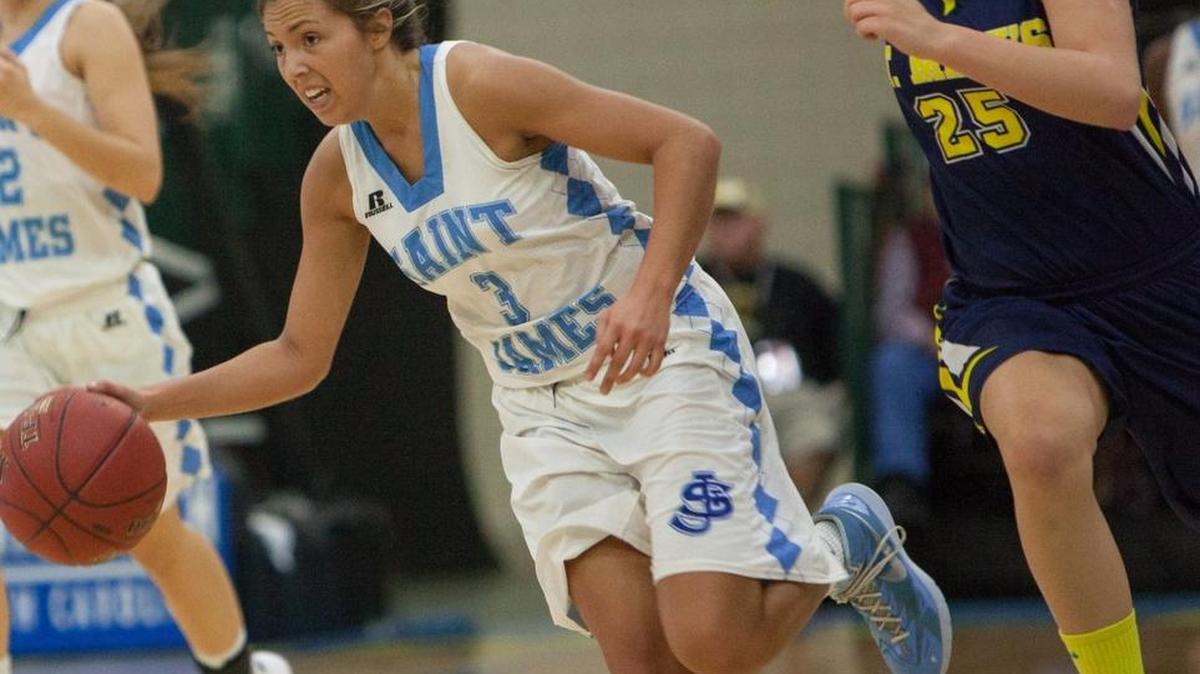 St. James’ Kelsi Bachmann dribbles up the floor during Friday’s game with St. Mary’s Catholic at the CresCom Bank Holiday Invitational at the Myrtle Beach Convention Center.