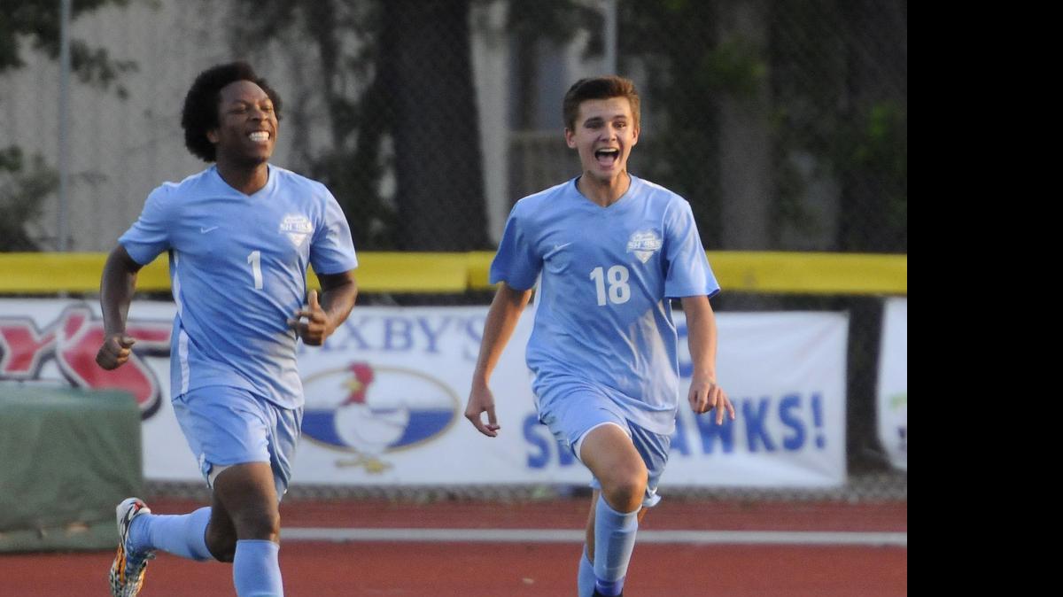 
St. James’ Quadarius Grate (left) and Luke Williams celebrate after one of Williams’ goals against Myrtle Beach on Tuesday.
