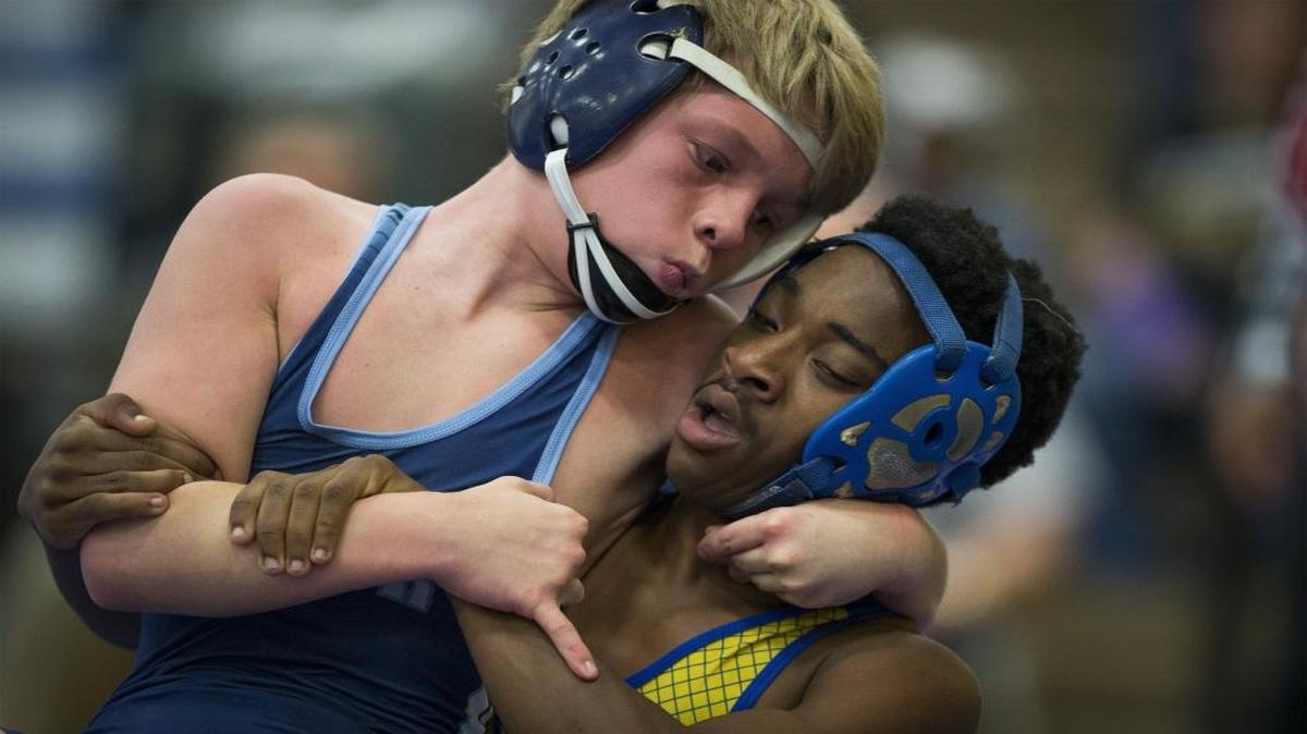 Loris wrestler Lorenzo Wallace, right, and Aynor's Carson Andrews battle during a 106 pound match Saturday during the 2017 Horry-Georgetown Wrestling Championships at North Myrtle Beach High School. Wallace defeated Andrews 16-3.