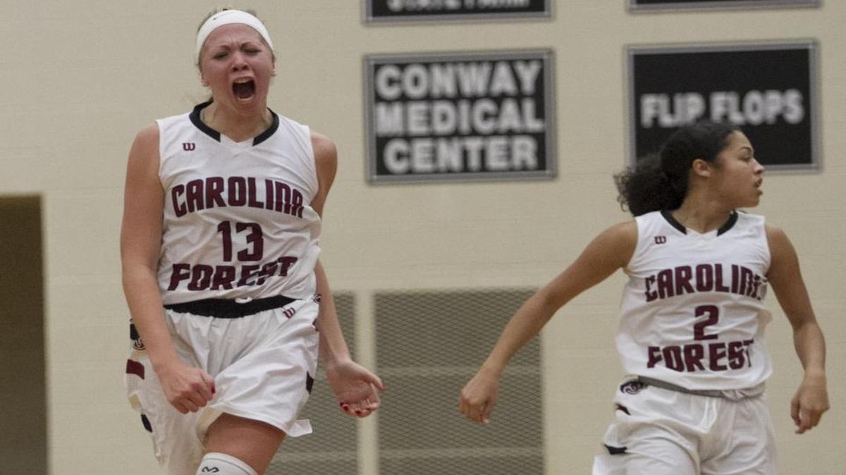 Carolina Forest's Alexis Tomlin (left) had 22 points and 18 rebounds, while Cheyenne Pyles (right) added 20 points to lead the Panthers to a 61-35 win over Socastee on Thursday night.
