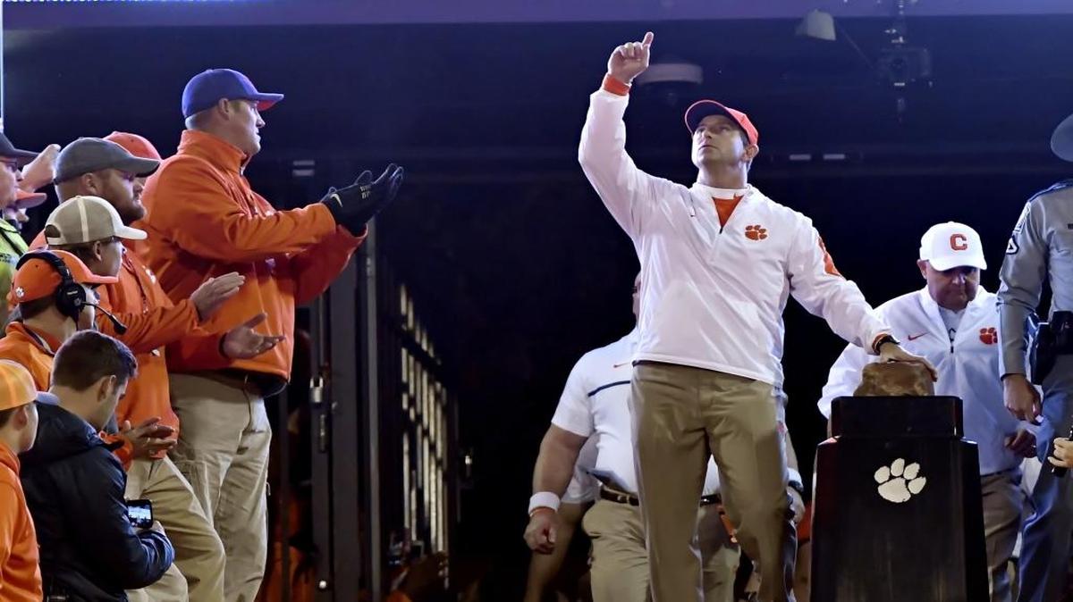 Clemson head coach Dabo Swinney points to the sky before the start of last Saturday’s game against South Carolina. The Tigers play Virginia Tech in the ACC Championship game Saturday.