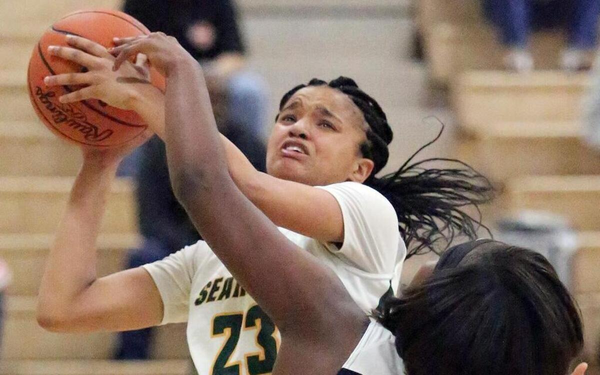 Myrtle Beach's Kiana Adderton shoots as the Seahawks defeat Georgetown 70 to 27 on Tuesday, Jan. 3, 2017.
