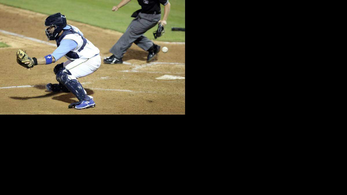 
Pelicans' Victor Caratini misses the ball and the Blue Rocks' Mauricio Ramos comes in to score as the Myrtle Beach Pelicans take on the Wilmington Blue Rocks on opening night Thursday, April 9, 2015. The Pelicans will be at home through April 15, 2015. Photo by Janet Blackmon Morgan / jblackmon@thesunnews.com / @TSN_JBM
