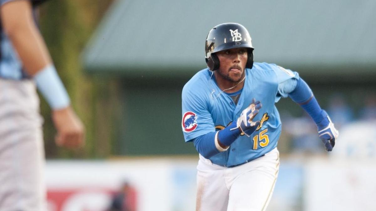 The Myrtle Beach Pelicans’ Robert Garcia digs for third base during a recent game.