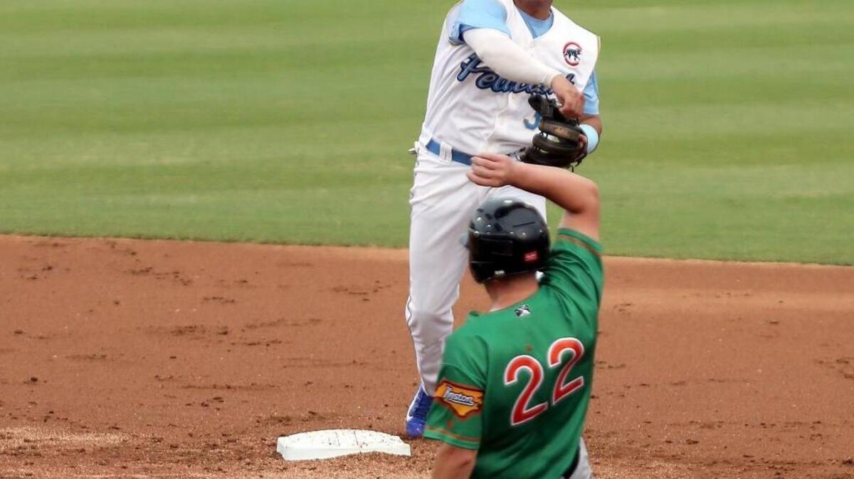 Myrtle Beach Pelicans' Bryant Flete makes the out at second base as Chuck Moorman of the Down East Wood Ducks slides in the game in Myrtle Beach on Wednesday, May 31, 2017. The Pelicans and the Wood Ducks play each other in Myrtle Beach through Saturday, June 3, 2017. Ticket Return.com Field at Pelicans Ballpark is located off 21st Avenue North.