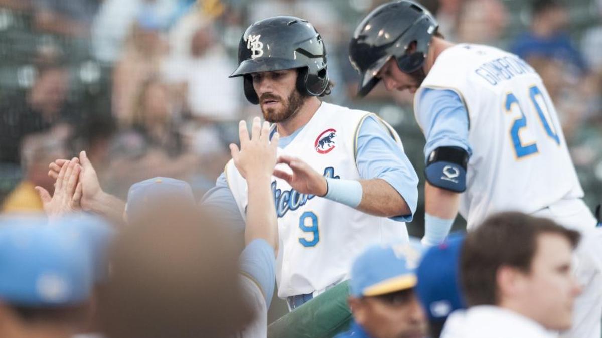 Myrtle Beach’s Connor Myers is greeted by his teammates after scoring a run during a game earlier this season.