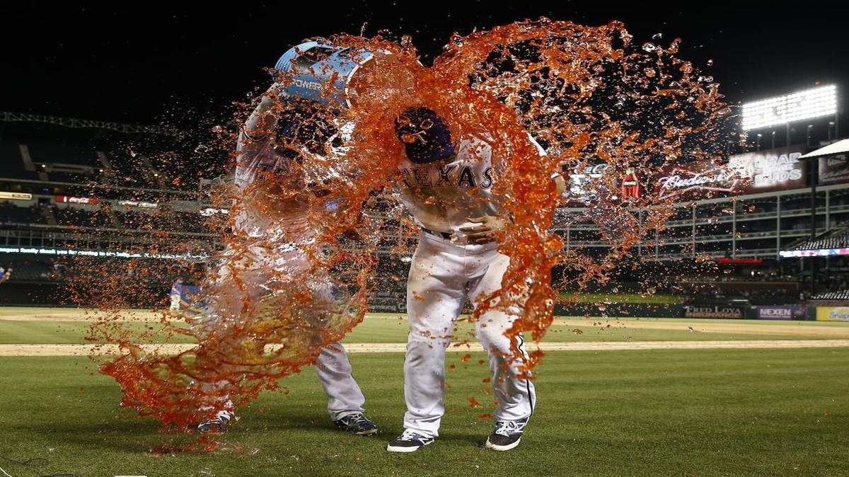 
Texas’ Joey Gallo (right) is doused by teammate Elvis Andrus following the Rangers’ 15-2 win over the Chicago White Sox on Tuesday. Gallo, a former Myrtle Beach Pelican, homered and drove in four in his major league debut.
