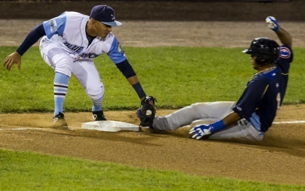 
Wilmington’s Mauricio Ramos tags out Myrtle Beach’s Gleyber Torres at third base.

