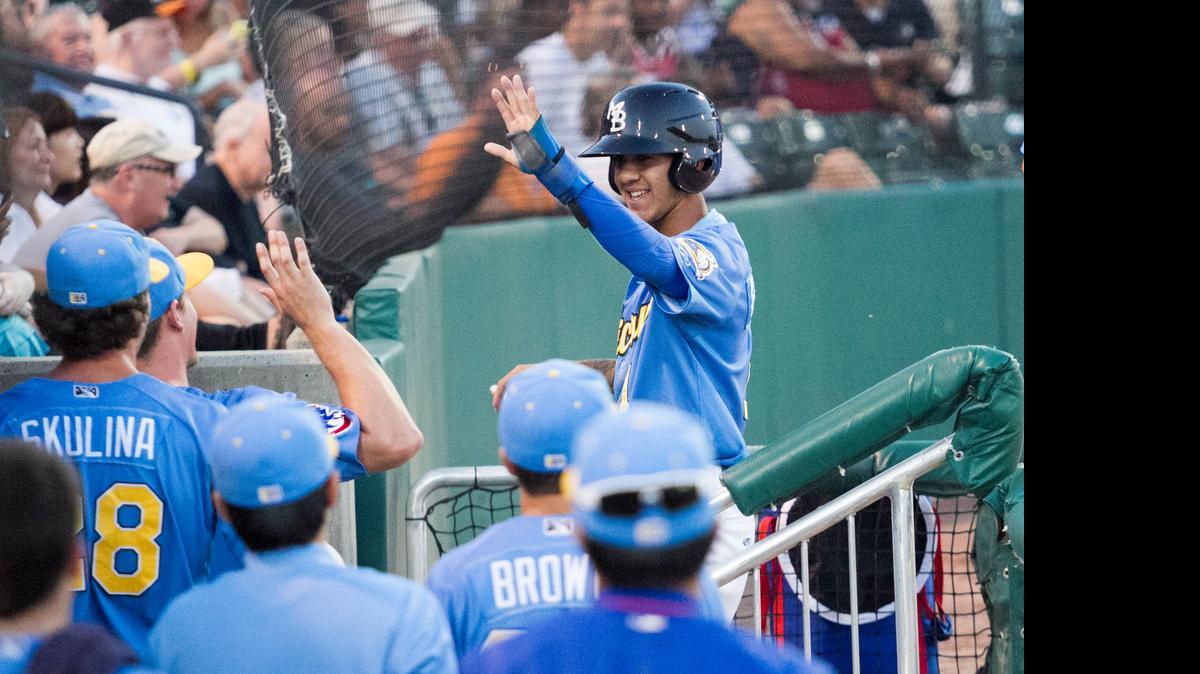 
Carlos Penalver get's high fives from the dugout after scoring against the Keys. The Myrtle Beach Pelicans took on the Frederick Keys in a hard fought battle on Thursday night.
