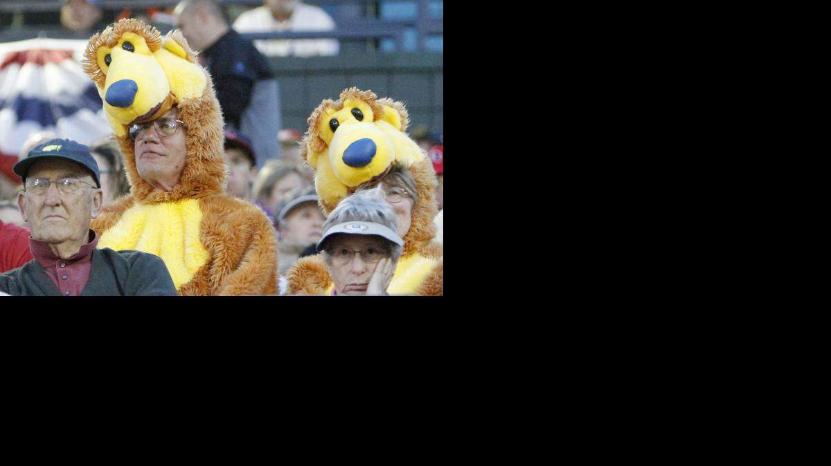 
A couple is dressed for the new Chicago Cubs affiliation as the Myrtle Beach Pelicans take on the Wilmington Blue Rocks on opening night Thursday, April 9, 2015. The Pelicans will be at home through April 15, 2015. Photo by Janet Blackmon Morgan / jblackmon@thesunnews.com / @TSN_JBM
