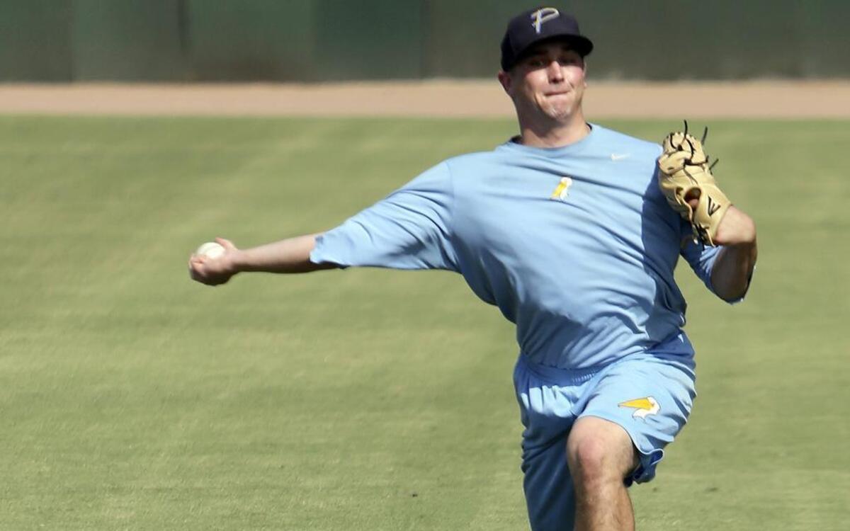 
Myrtle Beach Pelicans relief pitcher David Berg makes a throw during practice last week.
