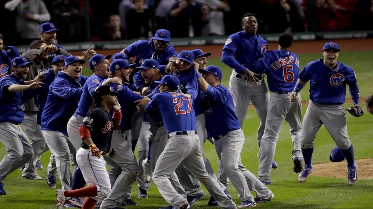 Chicago Cubs celebrate after Game 7 of the World Series. The Cubs beat Cleveland 8-7 in 10 innings to win the series 4-3.