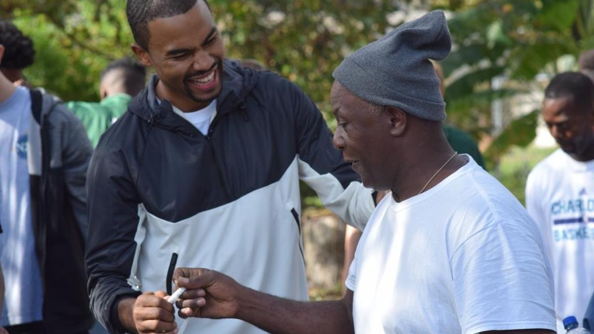 Ramon Sessions greets folks during his annual turkey drive in the Racepath community in November 2017.