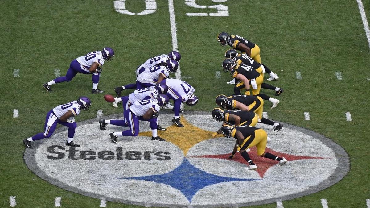 Minnesota Vikings long snapper Kevin McDermott (47) snaps the ball to punter Ryan Quigley during the second half Sunday’s game against the Steelers.