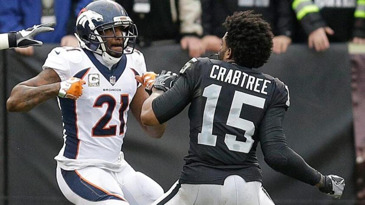 Denver Broncos cornerback Aqib Talib fights Oakland Raiders wide receiver Michael Crabtree during the first quarter of Sunday’s game. Both were ejected.