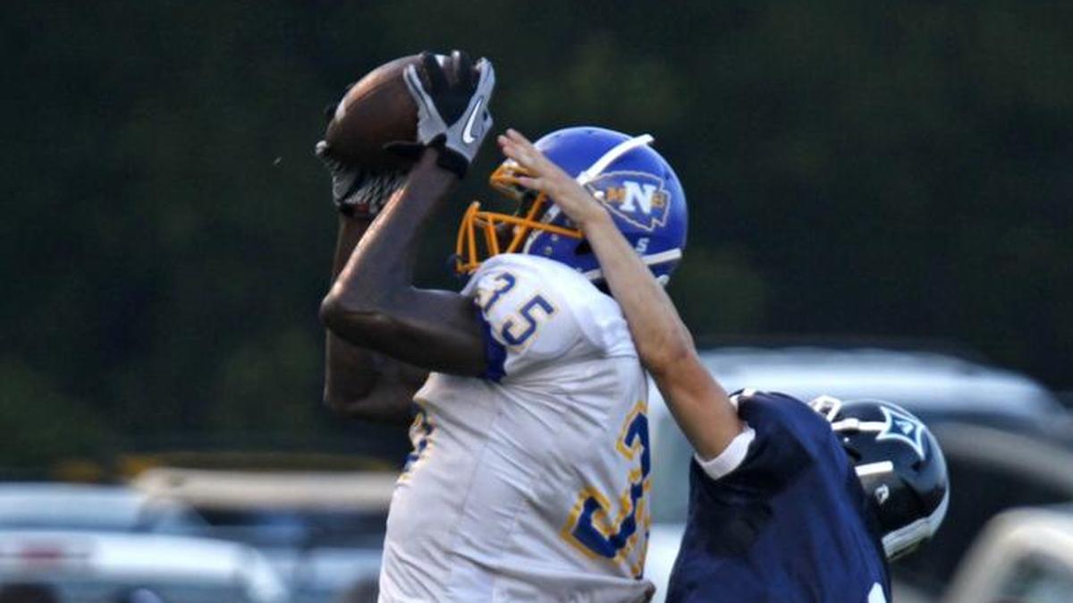 In this 2010 photo, North Myrtle Beach’s Temarrick Hemingway hauls in a pass in front of the outstretched arms of a defender. Hemingway was selected by the L.A. Rams with a sixth round pick in the 2016 NFL Draft and is in the Carolina Panthers preseason camp.