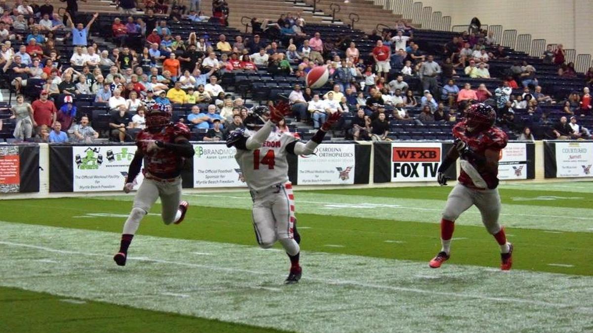 Former Conway High and Newberry College standout Jason Livingston catches the game-winning touchdown in the Myrtle Beach Freedom's inaugural regular season game March 28 against the Savannah Steam.