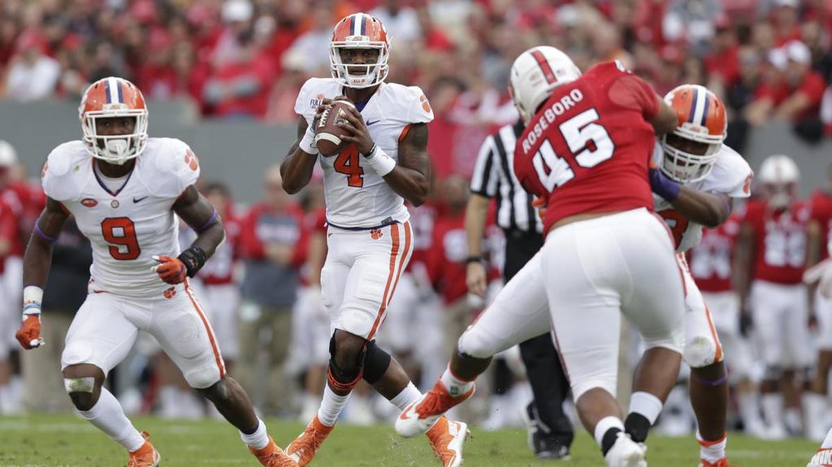Clemson quarterback Deshaun Watson (4) looks to pass against North Carolina State. After a win over the Wolfpack in what had the makings of a trap game, the Tigers are in prime position as the first College Football Playoff rankings roll out on Tuesday.