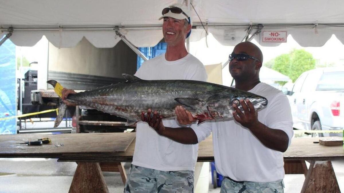 Marc Treurniet (left) and Nick Evans of Southport, N.C., show off a 49.75-pound king mackerel in 2017 at Southport Marina. The kings are being caught in large numbers off the Grand Strand coast.