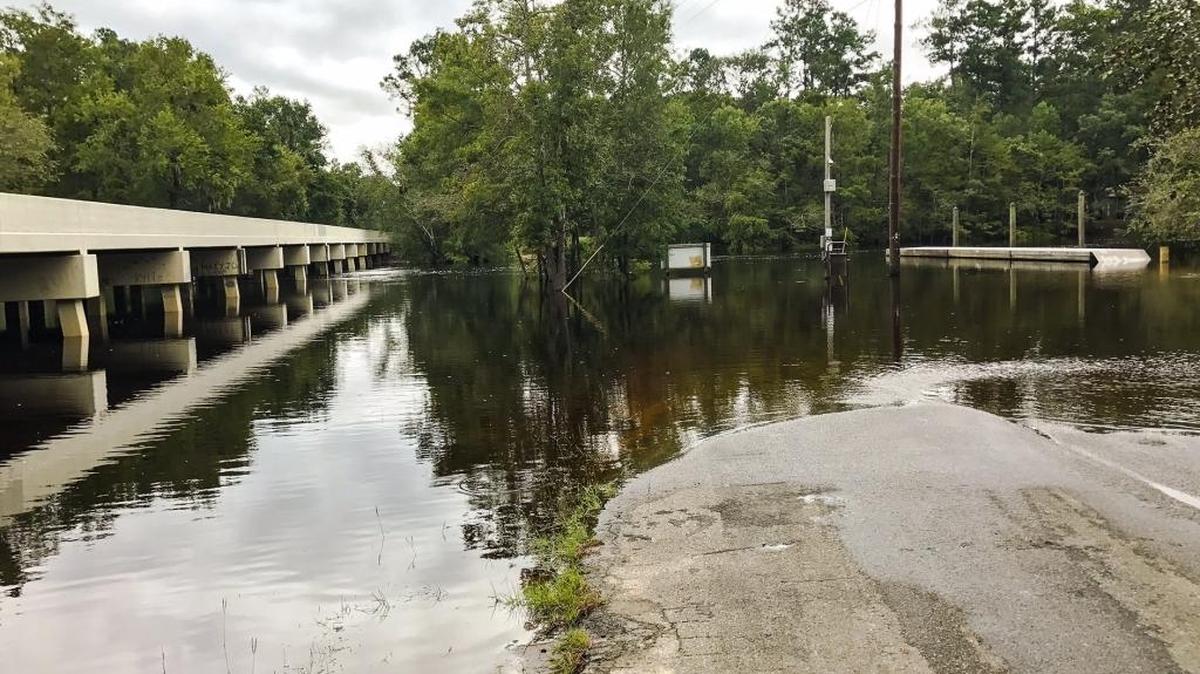 Floodwaters swamp the Reeves Ferry boat landing Monday on the Waccamaw River.