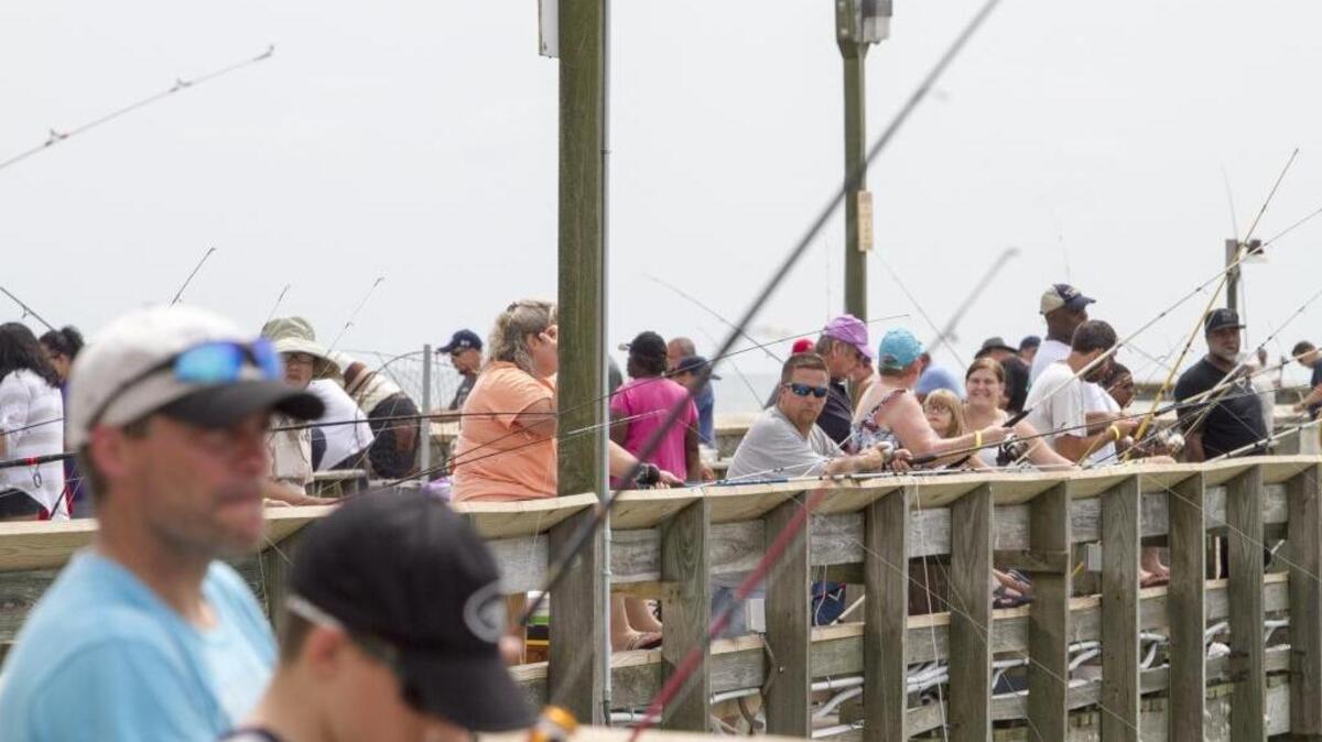 Hundreds of fishermen lined the rails of the Apache Pier for the ninth annual Locals Appreciation Day last year.