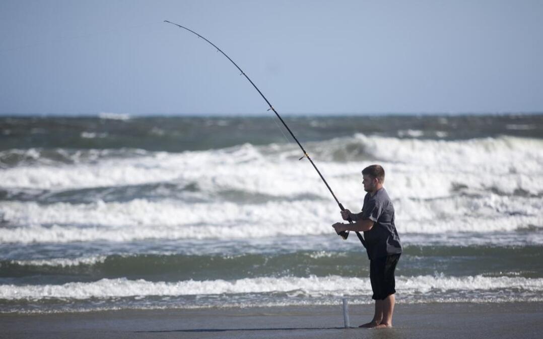 A man surf fishes near 12th Avenue South in North Myrtle Beach several weeks ago.