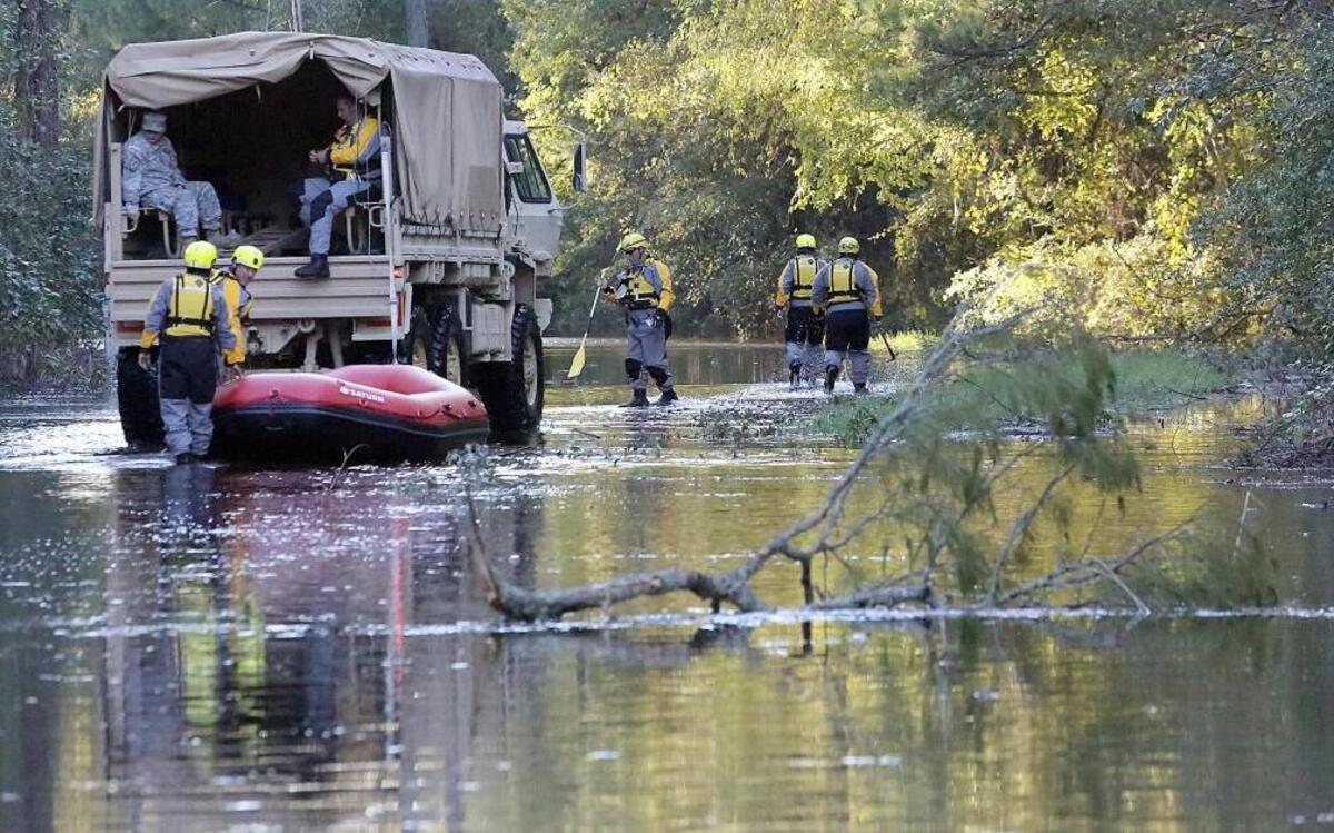 Most homes were surrounded by river water after the Waccamaw River rose at Jackson Bluff from the effects of Hurricane Matthew.