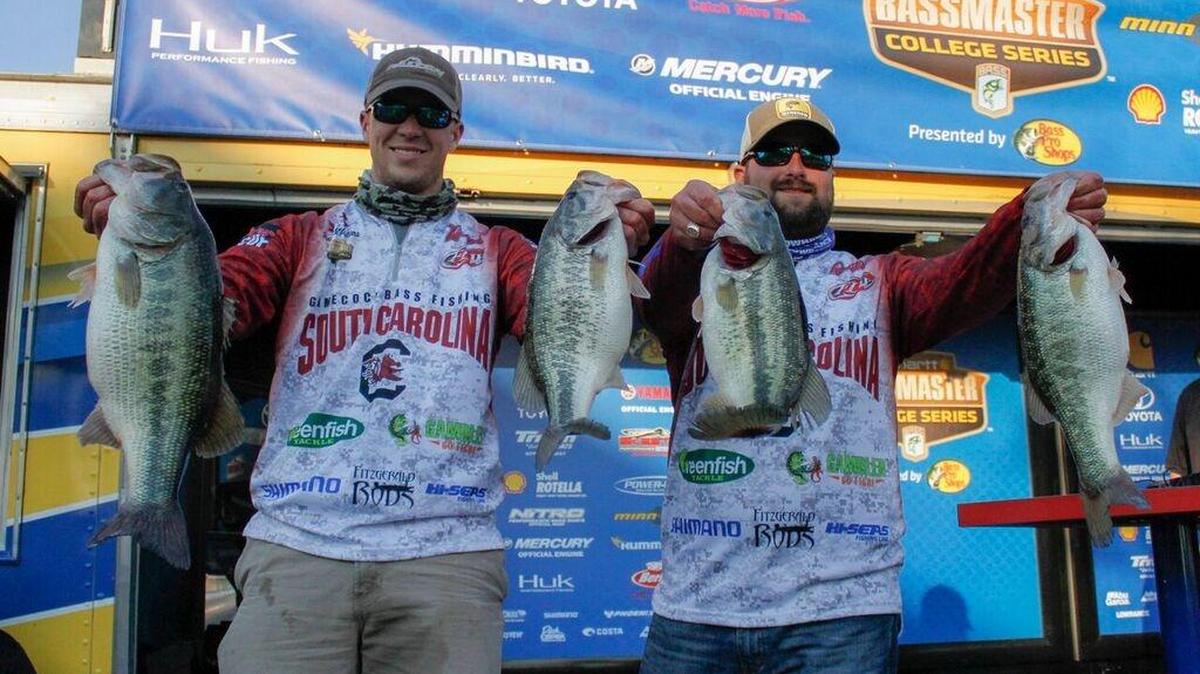 The University of South Carolina duo of Patrick Walters and Tyler All show off some of the bass they weighed in during the Carhartt Bassmaster College Series Southern Regional presented by Bass Pro Shops at Winyah Bay, held last weekend in Georgetown. Walters and All won the regional.