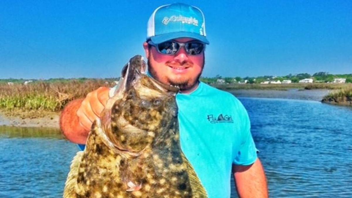 Capt. Jason Burton of Fly Girl Charters in Murrells Inlet with a doormat flounder. Changes to South Carolina's recreational flounder regulations could be coming.