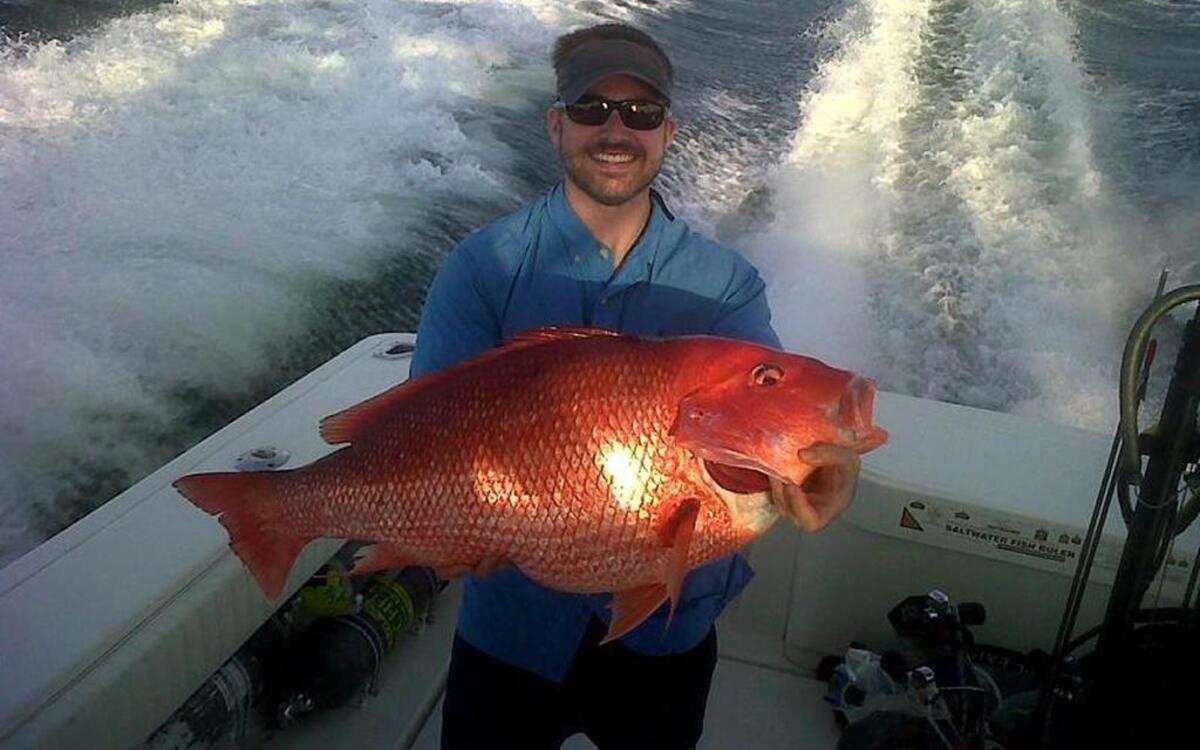 
S.C. State Representative Stephen Goldfinch Jr., shows off a red snapper he landed during a spearfishing trip out of Murrells Inlet.
