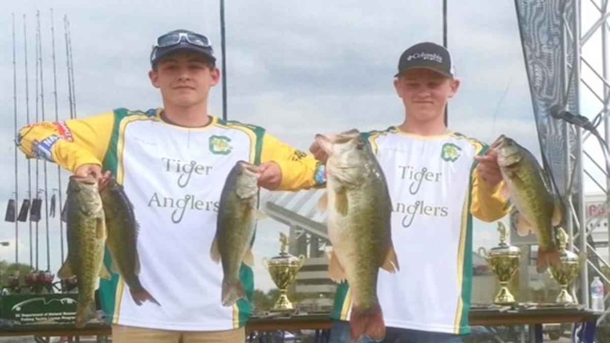 Noah Jones and Manning Feldner of Conway Middle School show off part of their catch during the fourth annual S.C. Department of Natural Resources Youth Bass Fishing Championship last Saturday on Lake Murray.