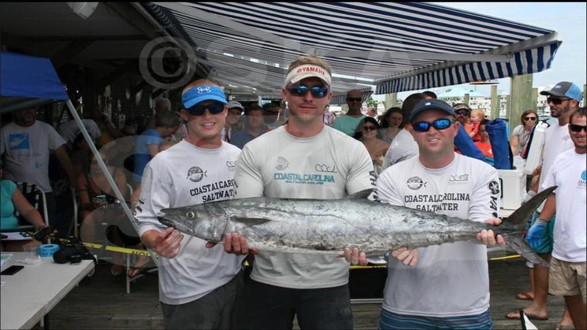 Prof. Joe Winslow and his Coastal Carolina University fishing team aboard Hooligan finished second in the S.H.A.R.E. King Mackerel Tournament out of Wilmington, N.C., on Sunday. From left are Josh Gray, Drew Gantt and Matt Eisenberger.
