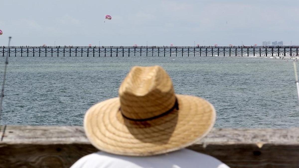 Anglers set up on Pier 14 and 2nd Avenue Pier this past summer.