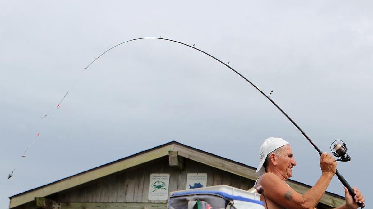 Dennis Caruso tosses a line from the Myrtle Beach State Park Pier earlier this year.