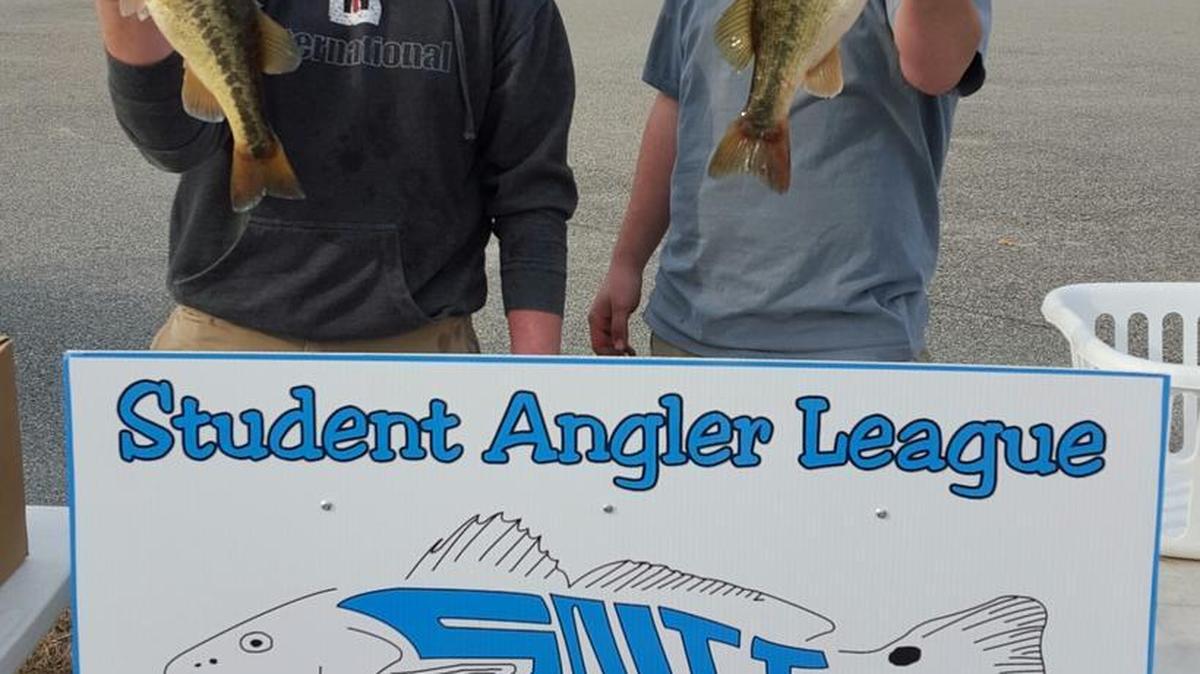 Todd Howard and Ben Cooper of Conway High School display their two bass weighing an aggregate of 4.48 pounds in a SALTT event last Saturday in Georgetown.