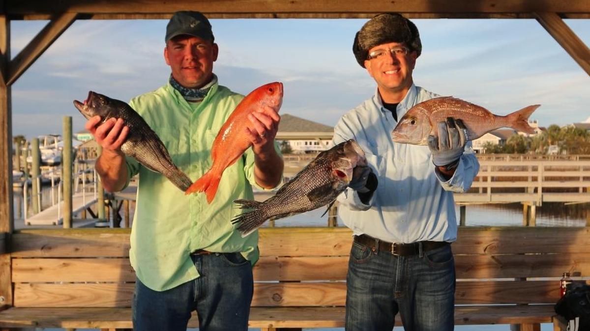 Dr. Brian Rabon and Dr. Jason Rosenberg display black sea bass, vermilion snapper and red porgy caught on Wednesday's trip aboard Painkiller out of Murrells Inlet.