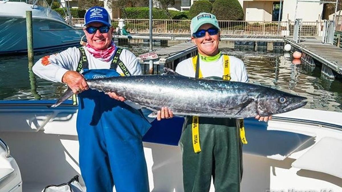 Jeff and Michelle Drake show off the winning 35.87-pound king mackerel Sunday in the Marlin Quay King Mackerel Shootout.