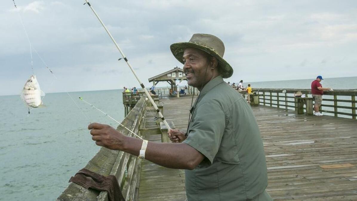 Gene Ward of Conway lands a pin fish on the pier at Myrtle Beach State Park. Myrtle Beach residents and visitors can find a natural retreat at Myrtle Beach State Park where guests have access to the beach, fishing pier, a lush maritime Forest and many other attractions.
