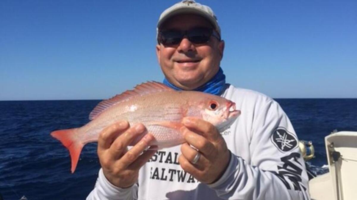 Gregg Holshouser displays a vermilion snapper caught with Capt. Jay Sconyers of Aces Up Fishing on Nov. 3.