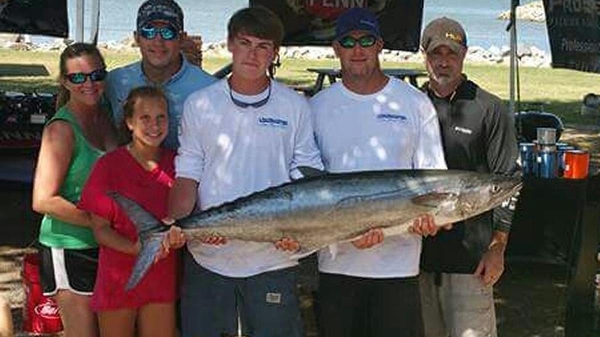 The crew of Nauti Gull shows off the new SKA South Carolina record king mackerel caught Saturday in the James Island Yacht Club King Mackerel Tournament. From left are Sarah Burke, Lilie Wilkinson, Brian Wilkinson, Chance Sullivan, Chad Sullivan and Will Schexnayder.