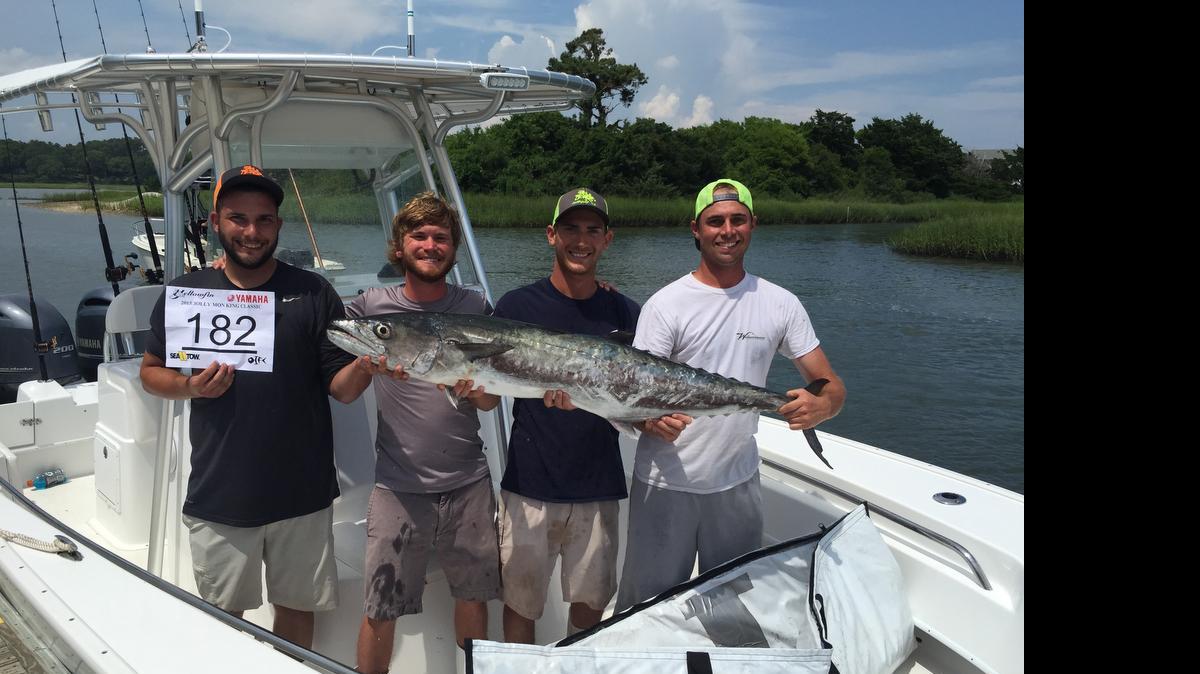 
The crew of Wahooligans, from left Doug Farlow, Aaron Wilkinson, Daniel Blanks and Billy Goss, show off their winning king mackerel in the Jolly Mon King Classic out of Ocean Isle Fishing Center on Saturday.
