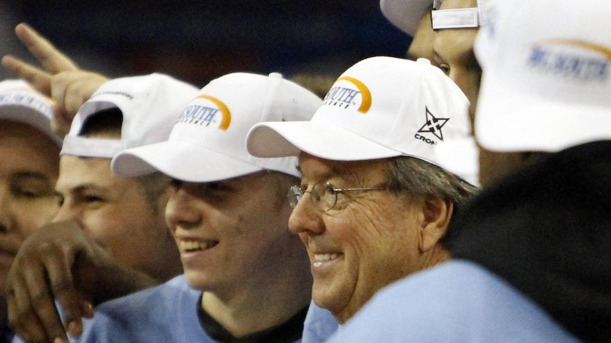 Coastal Carolina coach Cliff Ellis celebrates with some of his players after beating Winthrop 81-70 in the Big South Conference championship game on Sunday, March 8, 2015 to earn the program’s most recent berth in the NCAA Tournament.