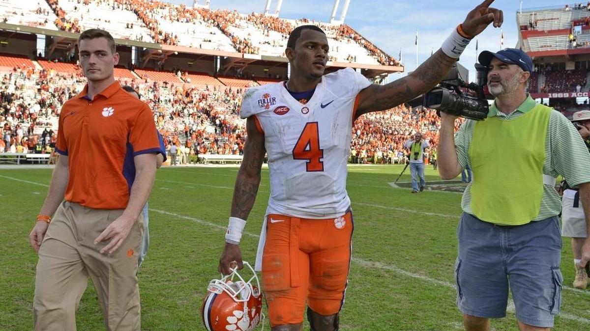 Clemson quarterback Deshaun Watson gestures to the fans after 37-32 victory over South Carolina.