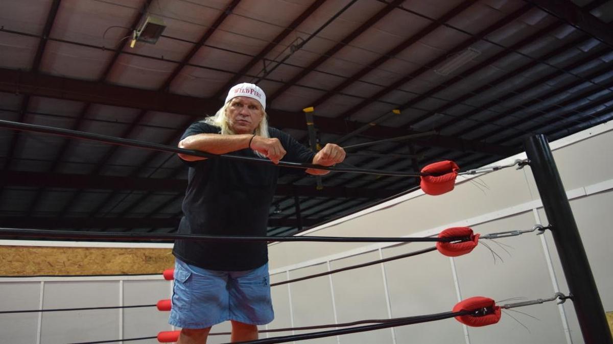 Thomas Richardson, a former NWA heavyweight champion under the moniker “Wildfire” Tommy Rich, is opening a wrestling school at X Gym Sports Mall on Aug. 5.