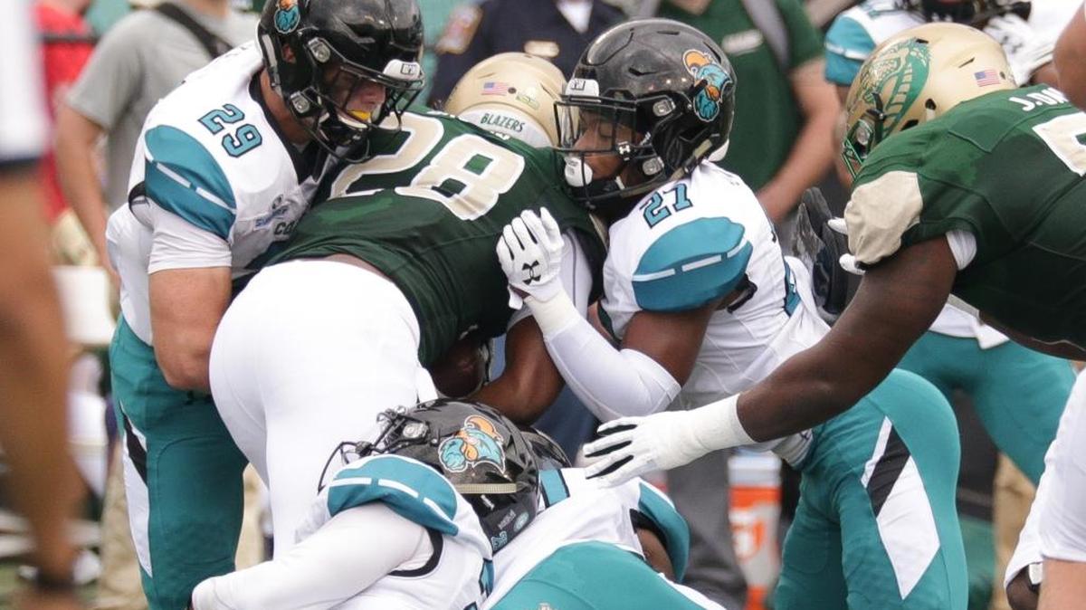 Silas Kelly (29) assists on a tackle of UAB running back Spencer Brown on Sept. 16, 2017 at Legion Field in Birmingham, Ala., during UAB’s 30-23 win. Brown already has seven career 100-yard rushing games early in his sophomore year.