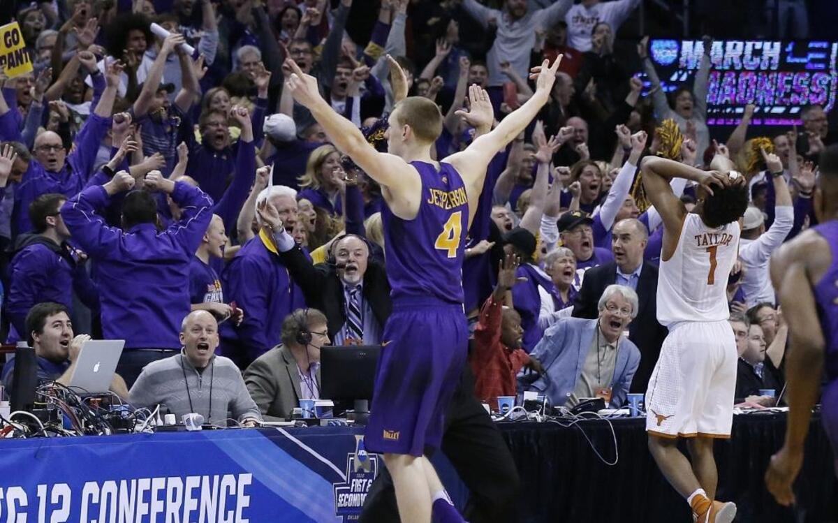 Northern Iowa guard Paul Jesperson gestures to fans after hitting the game-winning shot against Texas on Friday.