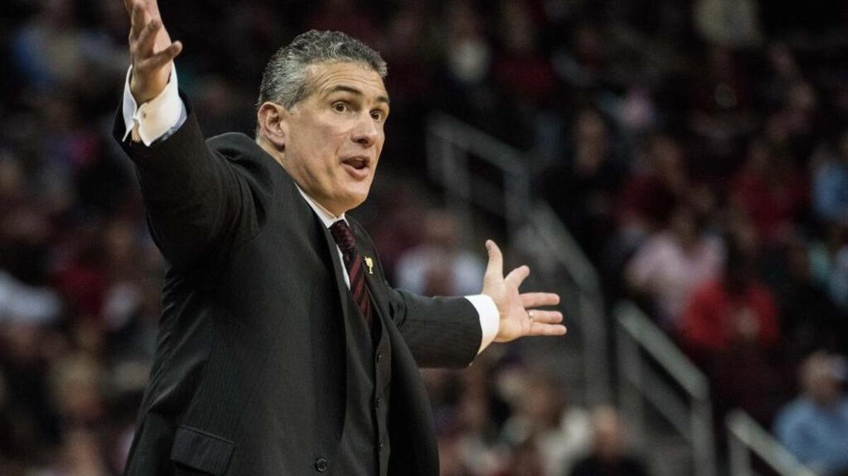 South Carolina coach Frank Martin questions an official’s call during Thursday’s game against Georgia.