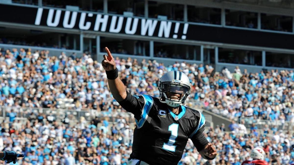 Carolina Panthers quarterback Cam Newton celebrates a touchdown against the Arizona Cardinals on Sunday.